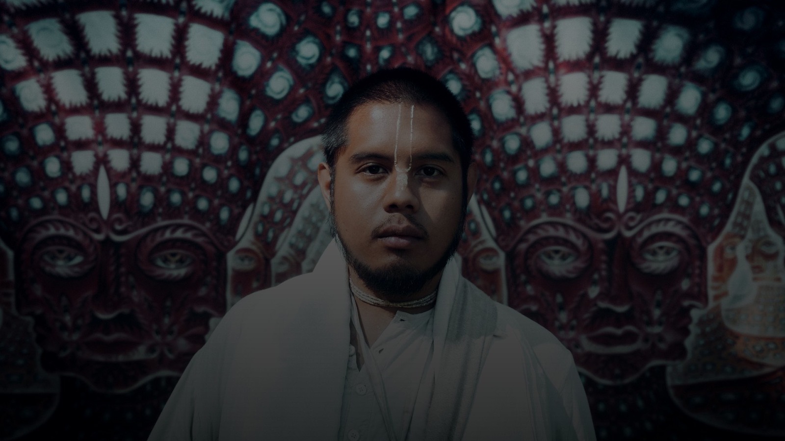 Jamil Apostol of Butter Thieves against a painted backdrop